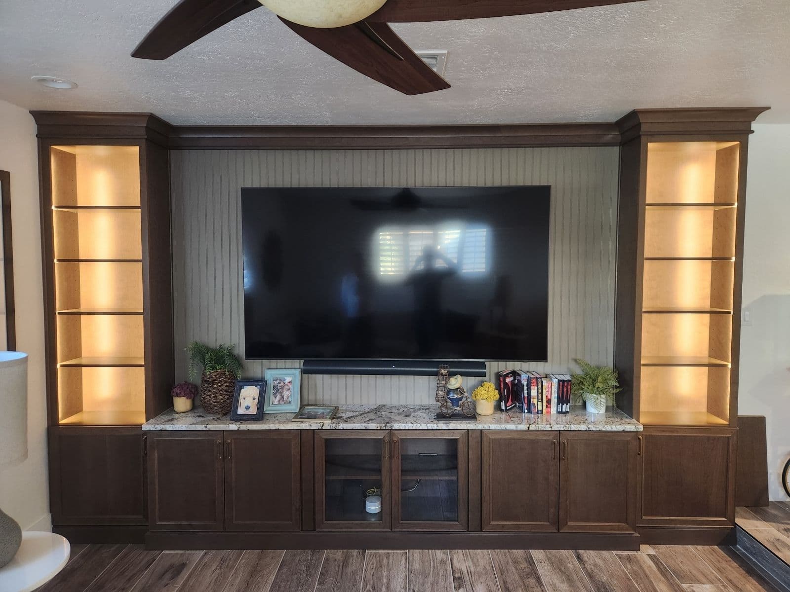 Sleek Living Room Setup with LED Back-Lighting